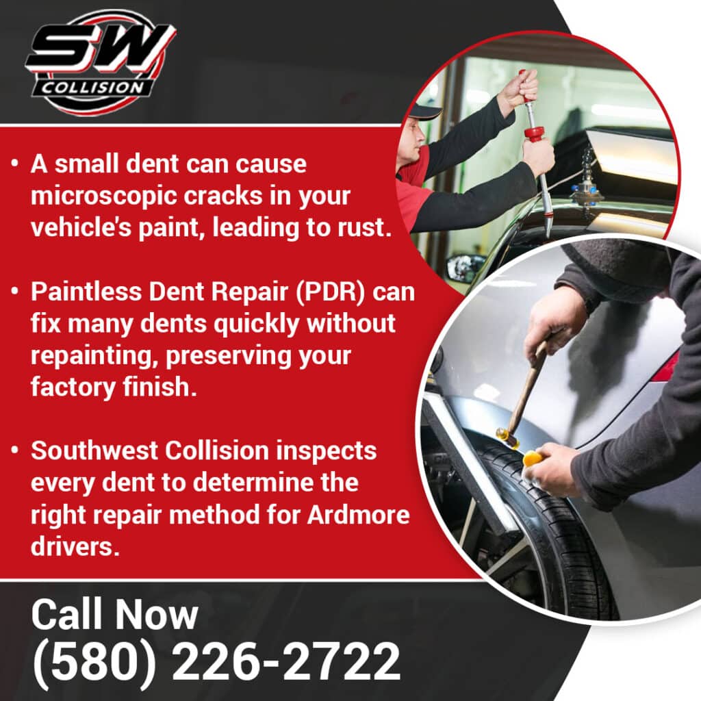 Auto body technician fixing dent with PDR tools while preserving original paint finish