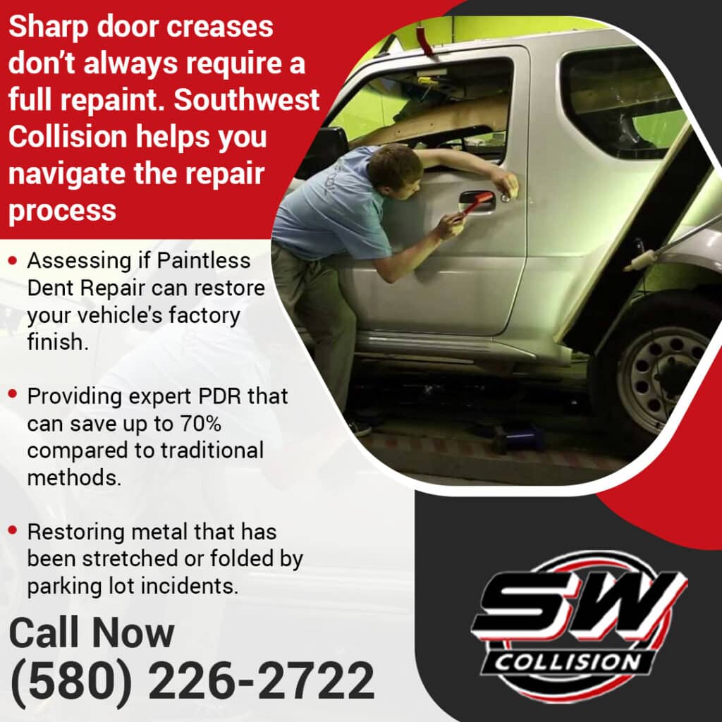 Technician performing paintless dent repair on a vehicle door at Southwest Collision to restore a sharp crease without full repainting